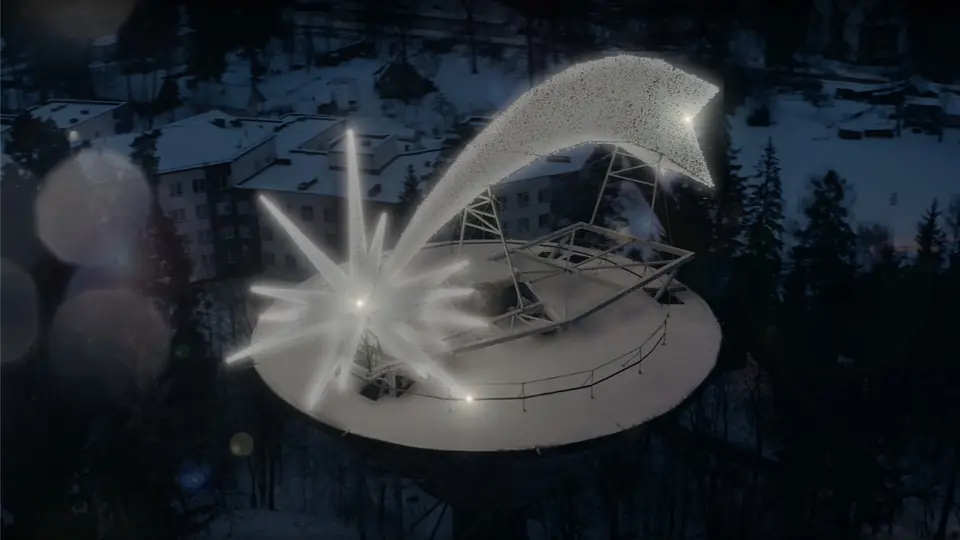 A large light comet and star installation on the rooftop platform