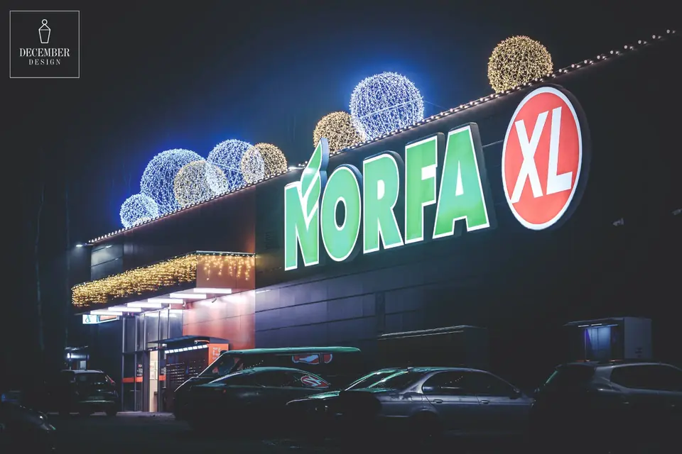 NORFA XL facade with blue and warm white light balls on the roof