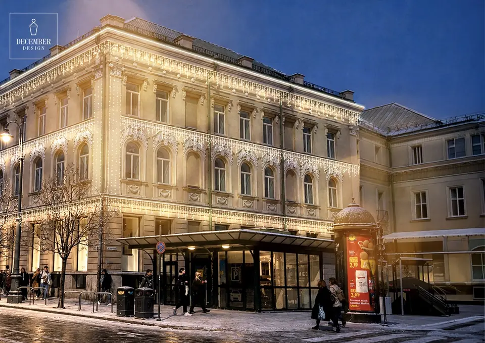 The facade of a historic building with a subtle warm white light design in winter