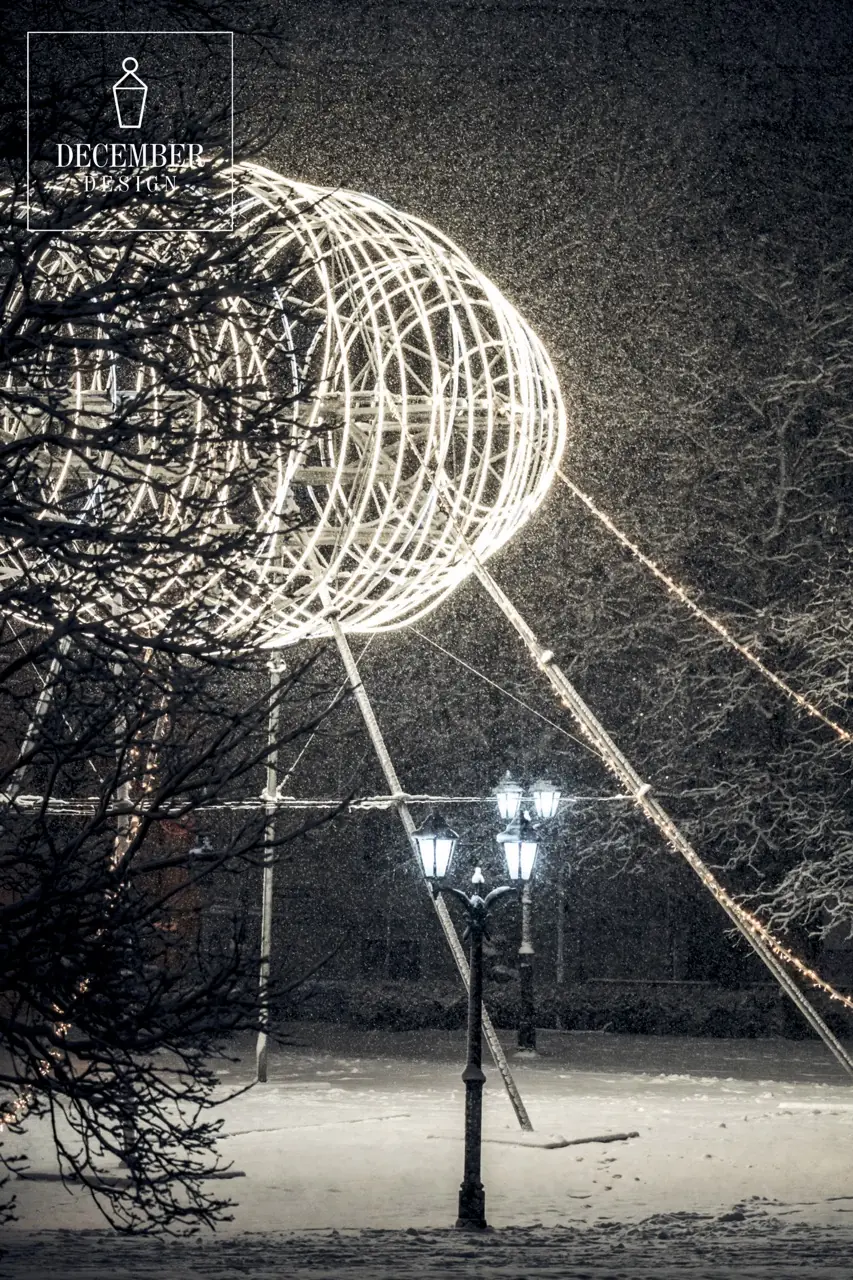 Light airship and historic street lamps in a snowfall