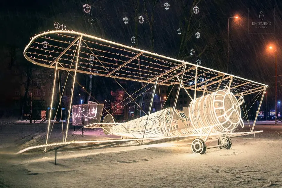 1:1 scale light plane in a snowy park at night
