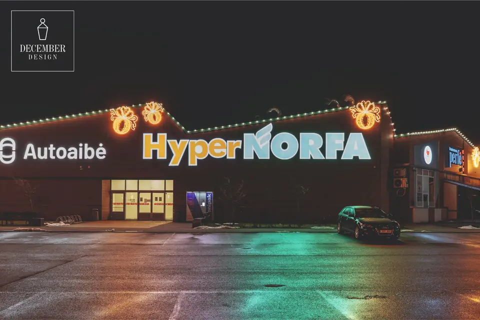 Hyper NORFA facade with illuminated ornaments and roof line